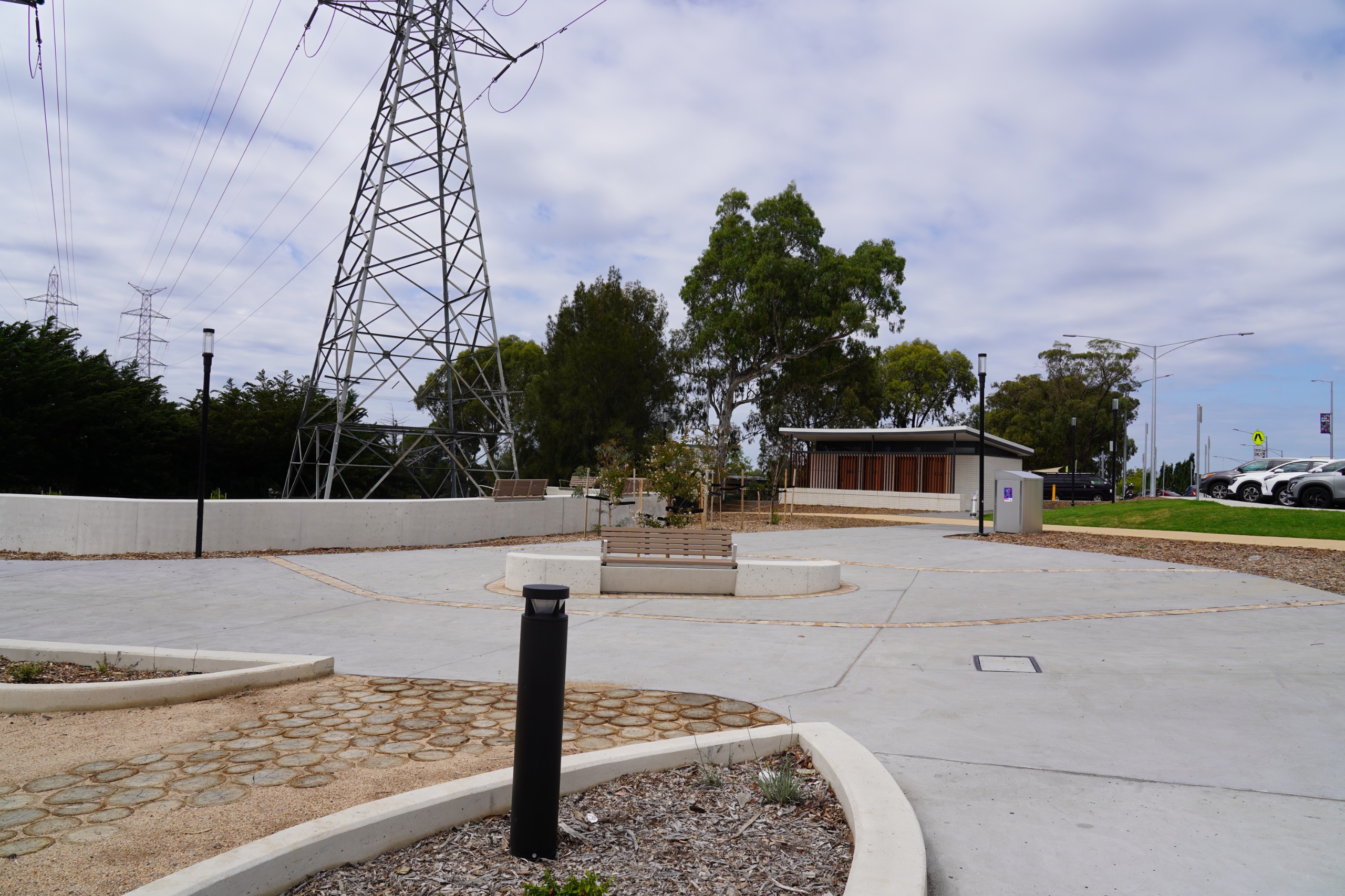 An image of an area near the public toilets that has seating 