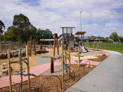 Photo of the completed works at James Reserve, showing the new play equipment, pathway network and plantings